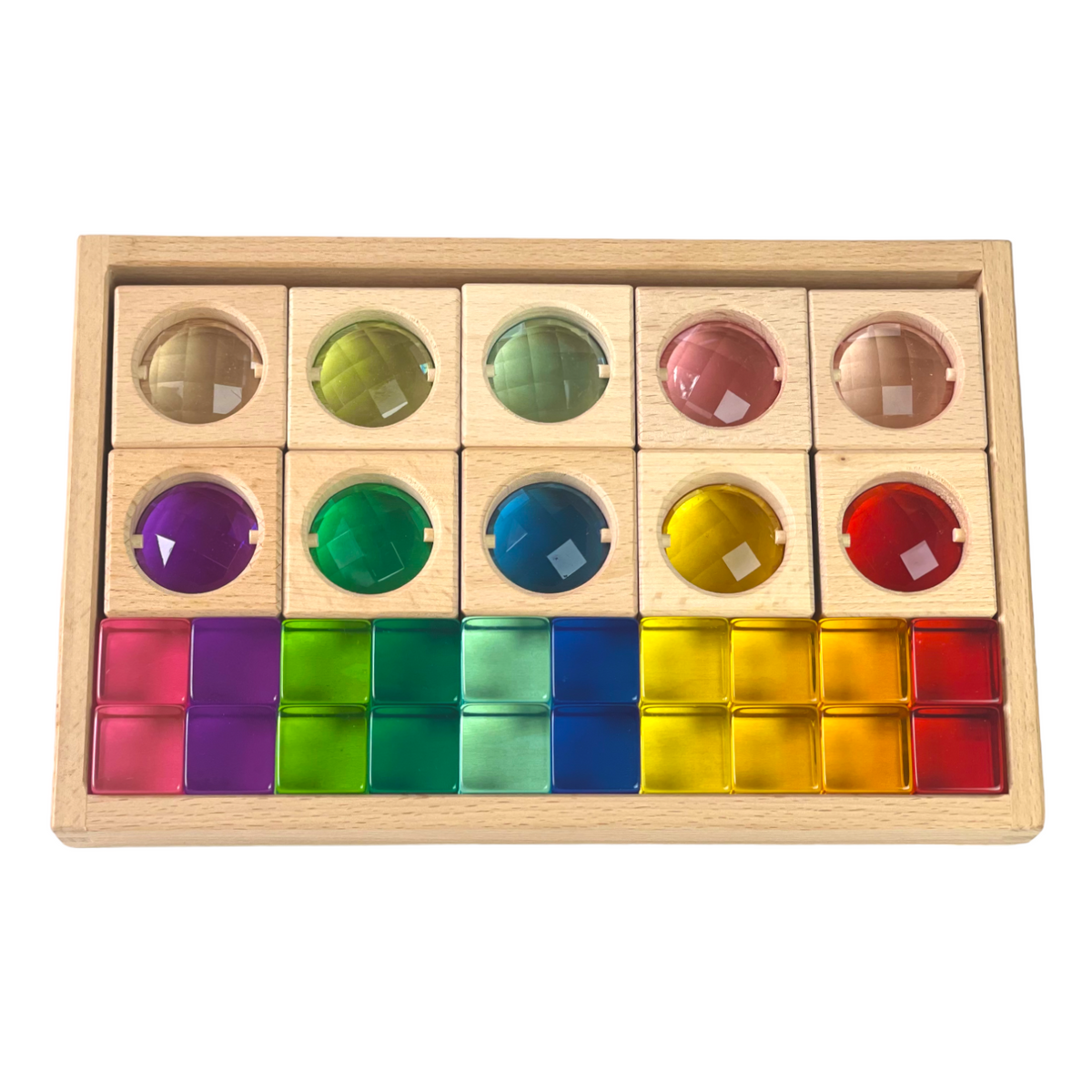 Gem window blocks in two rows above colored acrylic cubes in the wooden tray