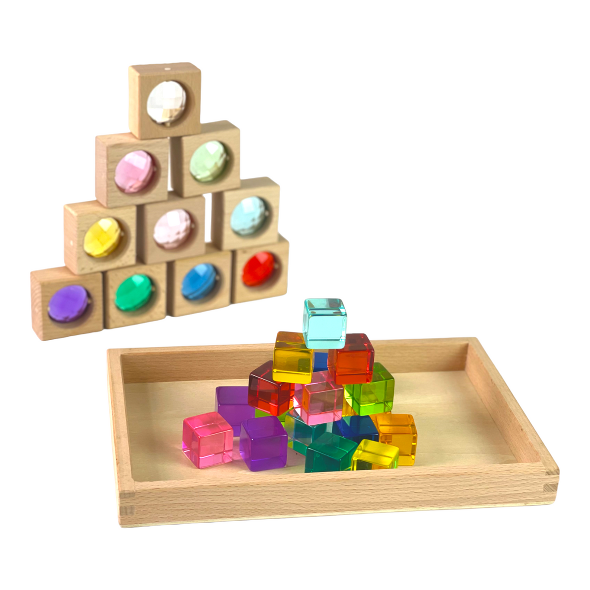 Wooden gem window pyramid beside a smaller acrylic cube pyramid in the tray