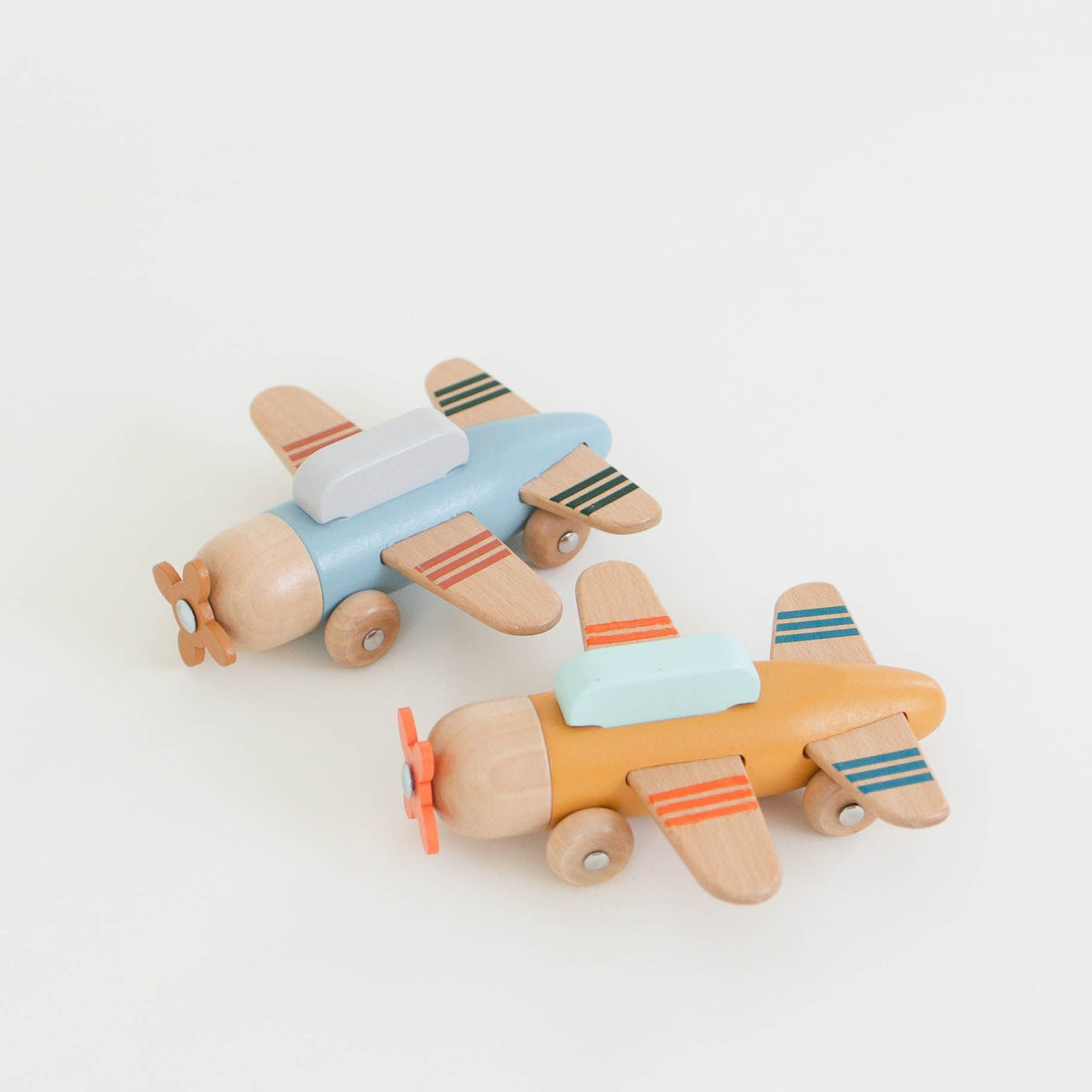 SpiritnSprout: Blue and gold wooden toy airplanes shown together