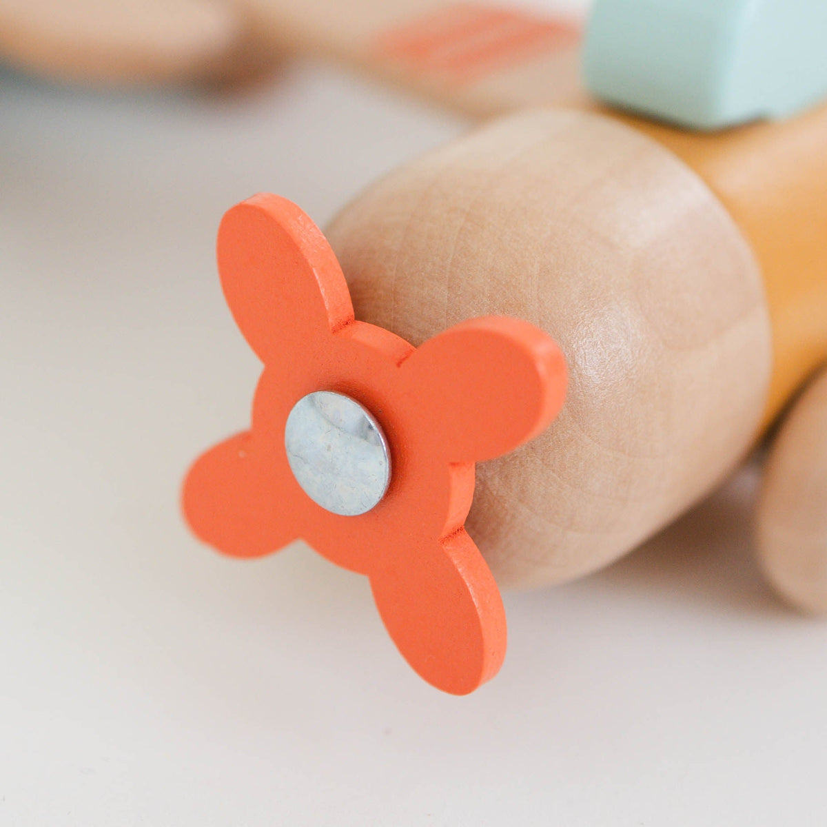 SpiritnSprout: Close-up of the gold airplane’s orange propeller