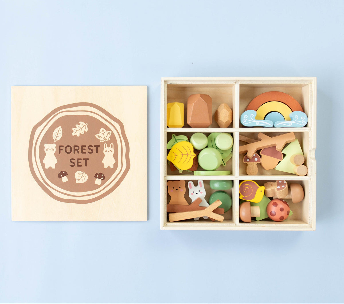 SpiritnSprout: Open wooden forest storage box with divided compartments and illustrated lid