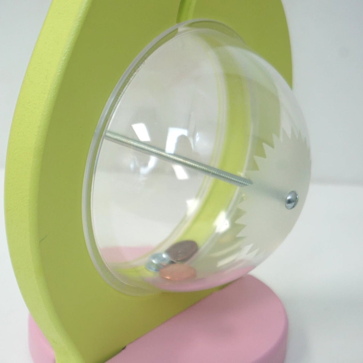 Side close-up of the flower bank clear belly, metal bolt and pink base