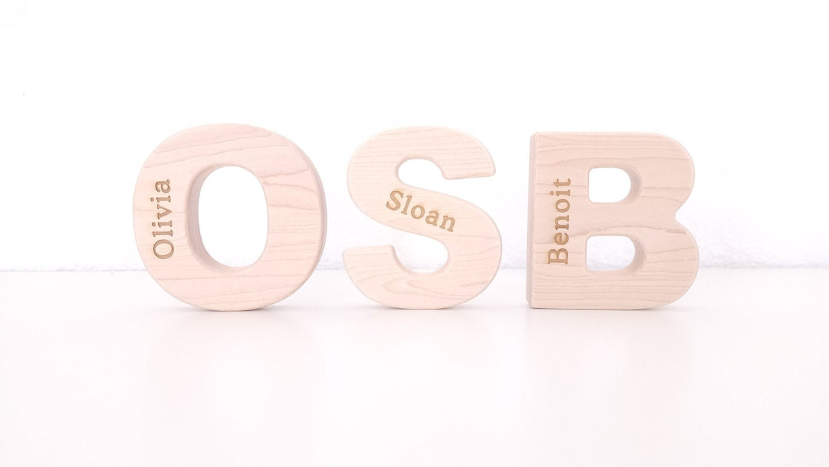 Wooden O, S and B alphabet grasping toys with example engraving