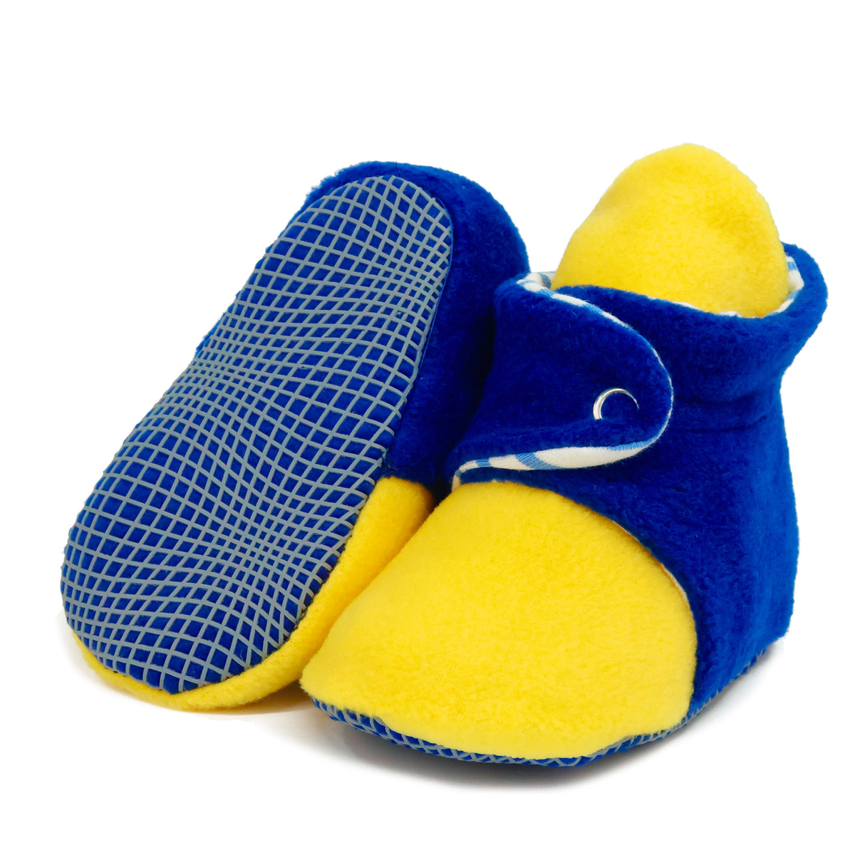 Blue-and-yellow fleece baby booties with striped lining and snap straps, with one sole facing the camera on a white background.