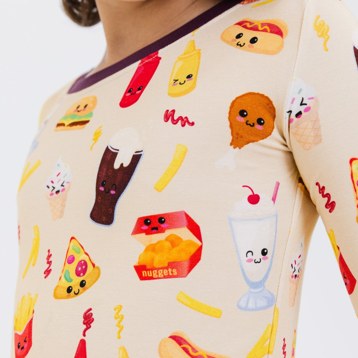 Close-up of the top and neckline on Bam & Stitch Blissful Bites Long Sleeve Pajamas.