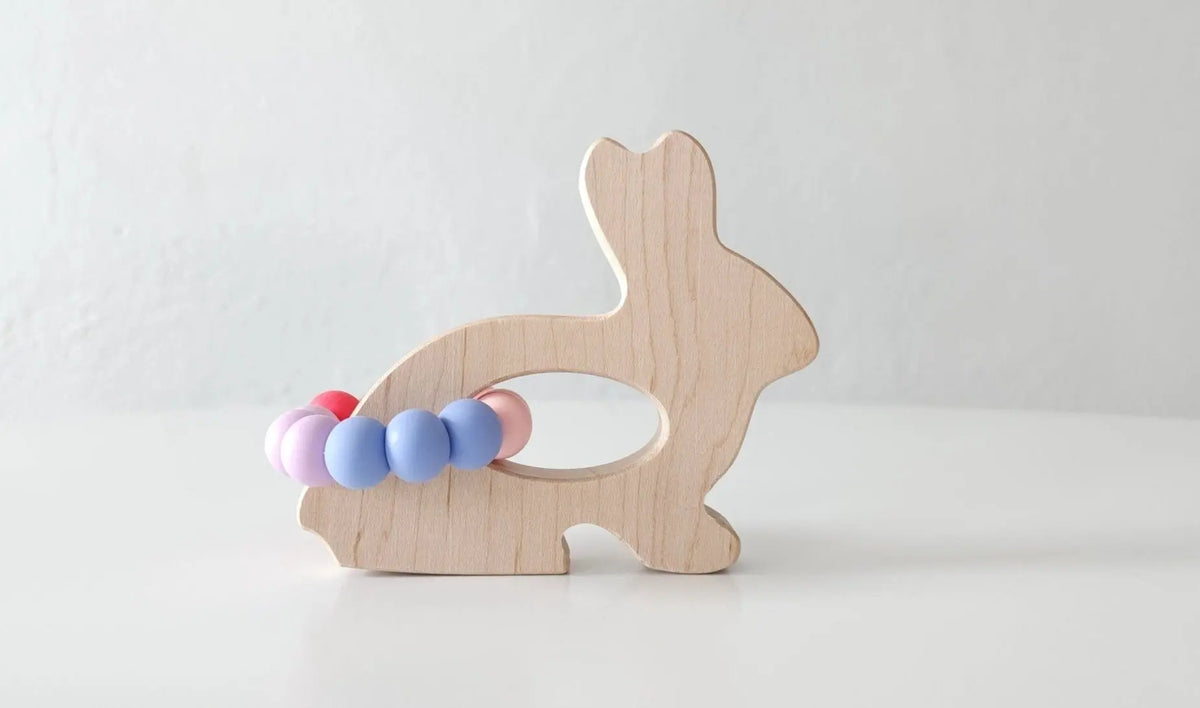 Bannor Toys Bunny Wooden Grasping Toy with Teething Beads, showing wooden outline and attached silicone beads