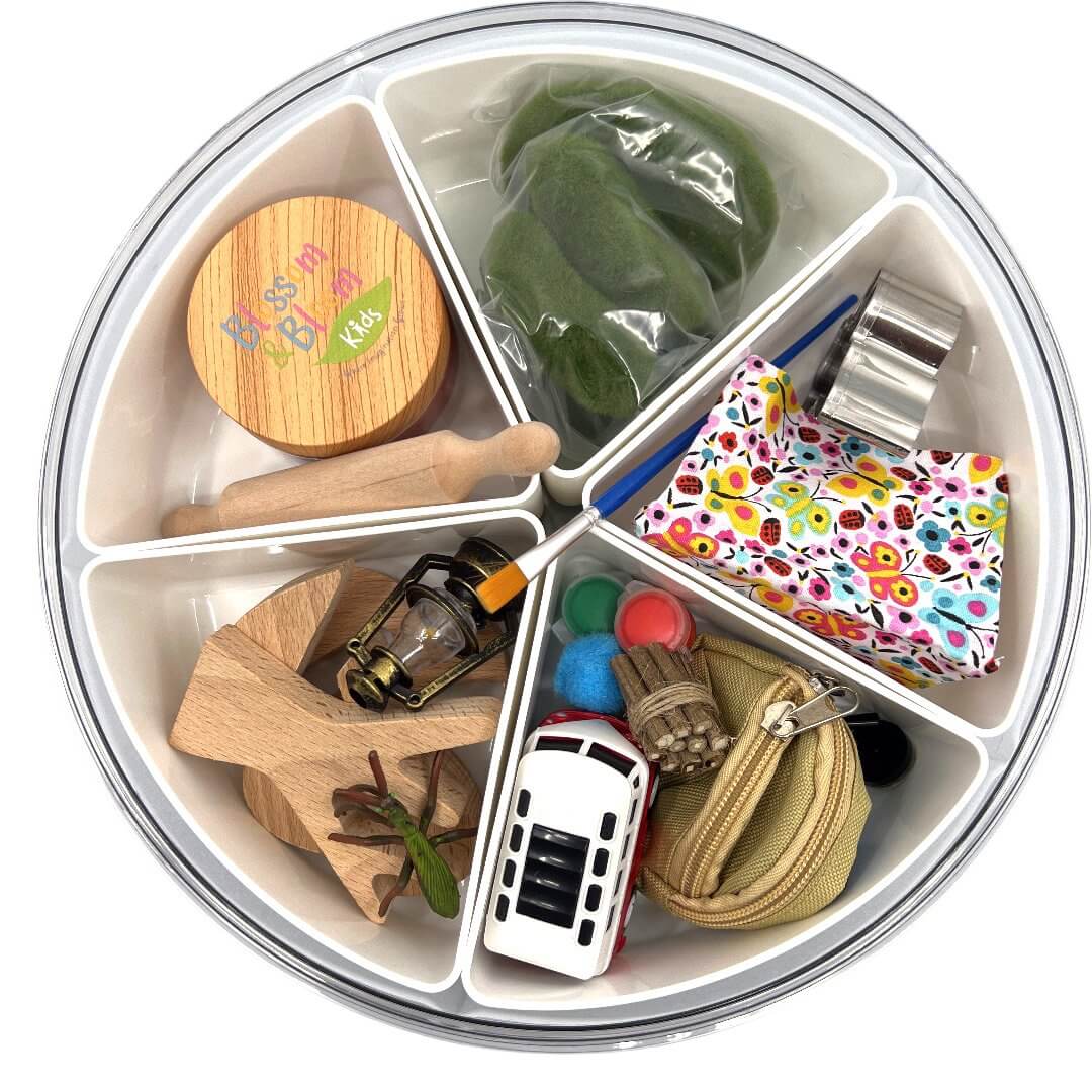 Overhead view of Camping Trip accessories and playdough jar in the storage case