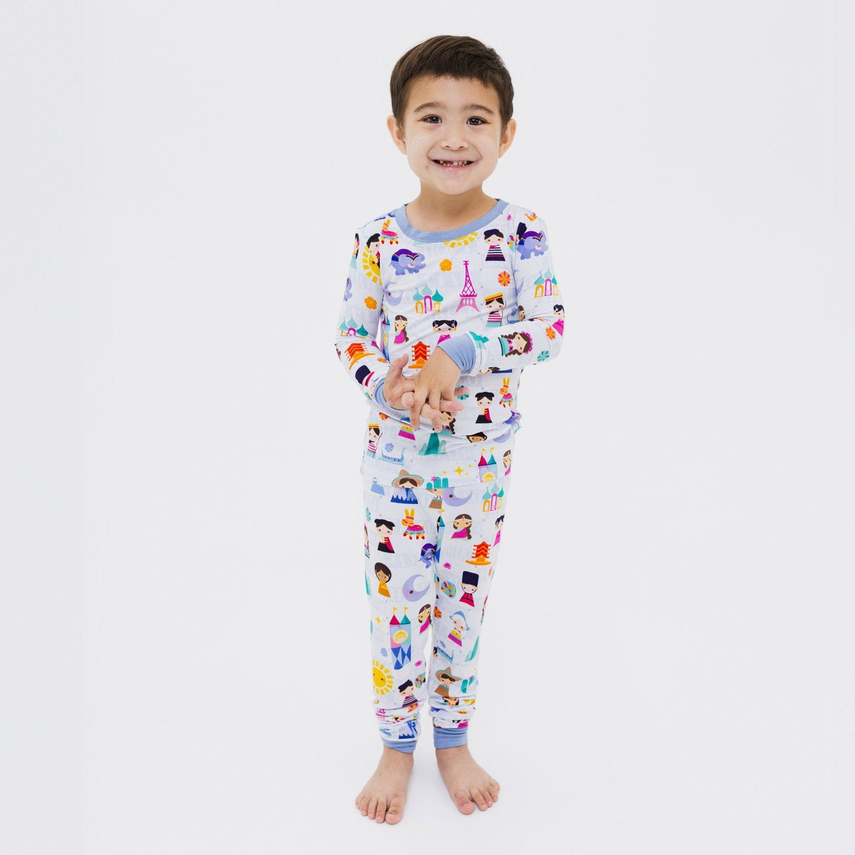Child wearing Bam & Stitch Children of the World Long Sleeve Pajamas.