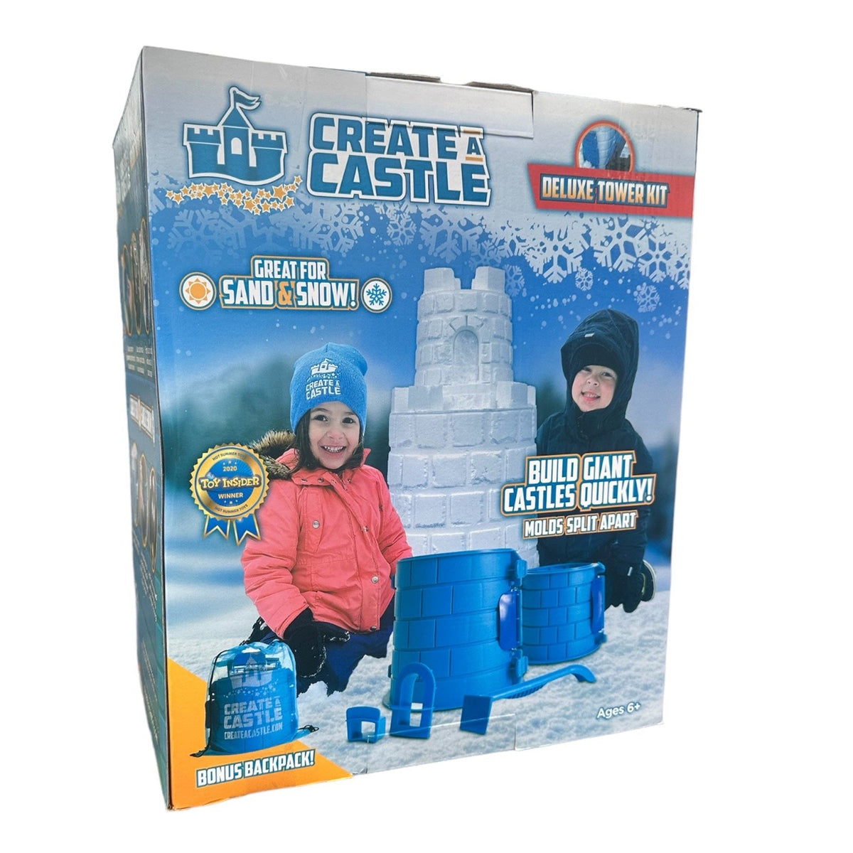 Create A Castle Deluxe Tower Kit retail box with snow-castle artwork and winter-clothing scene.