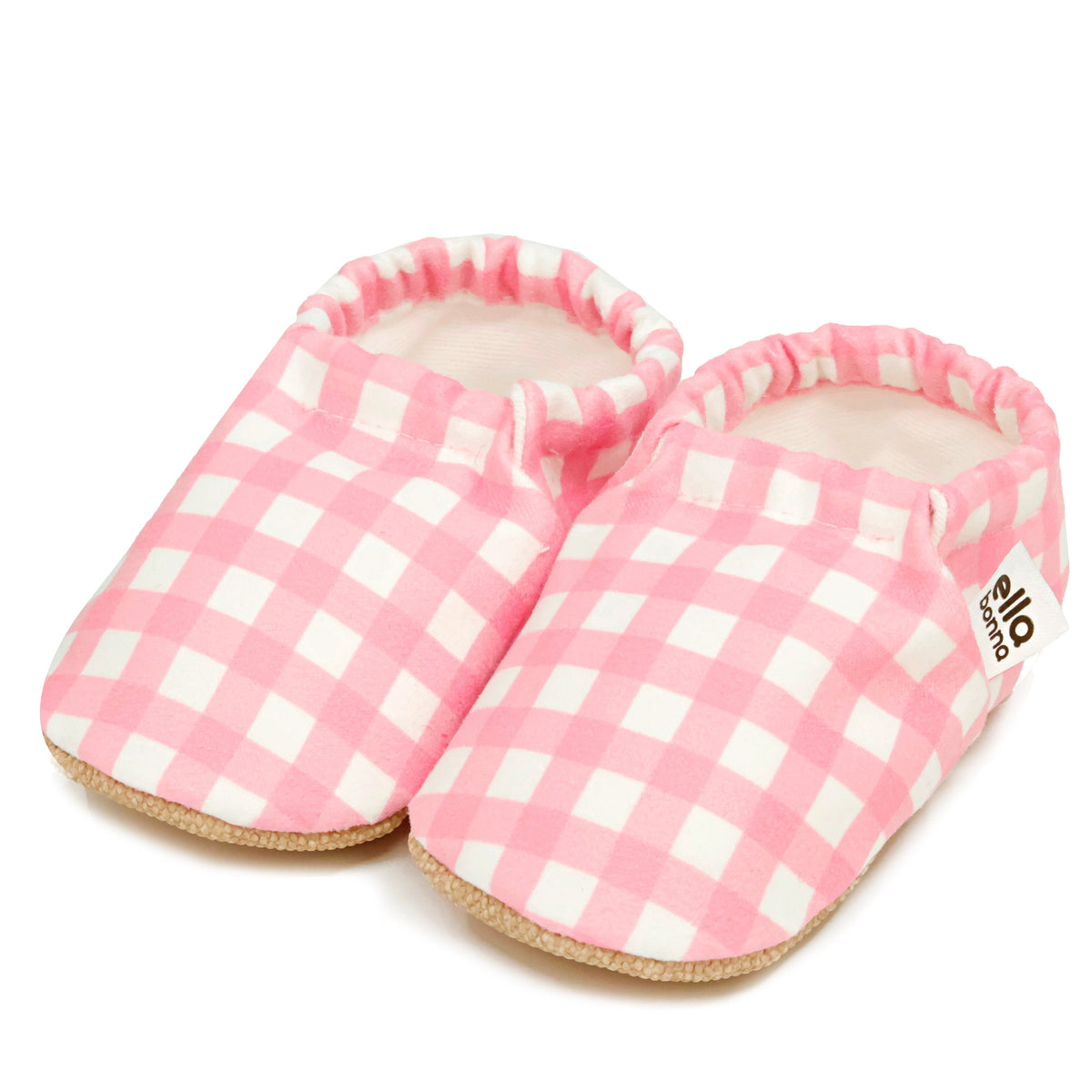 Pair of pink-and-white gingham slip-on baby moccasins on a white background.