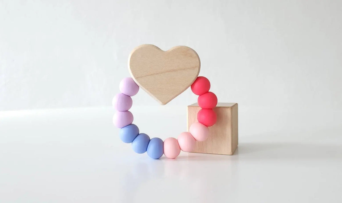 Heart Charm Teether with pink, purple and blue silicone beads