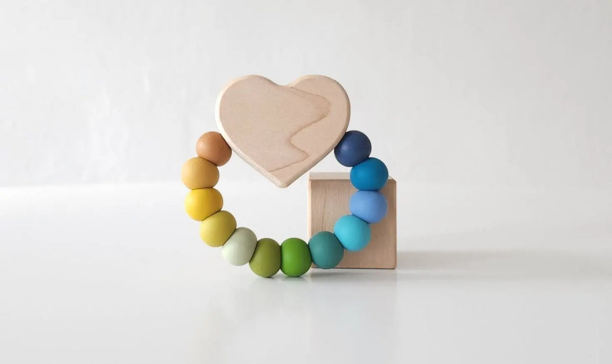 Heart Charm Teether with blue, green and yellow silicone beads