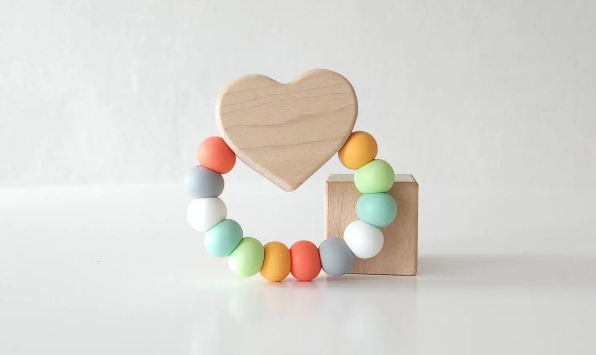 Heart Charm Teether with muted multicolored silicone beads