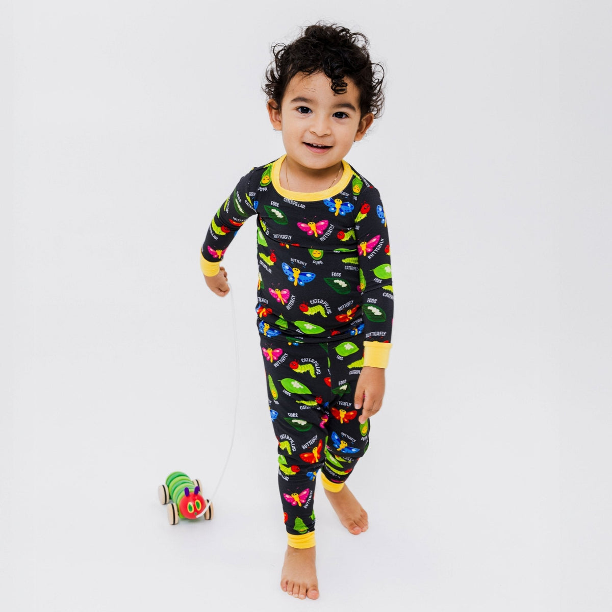 Child walking in Bam & Stitch It's Morphing Time! Long Sleeve Pajamas.