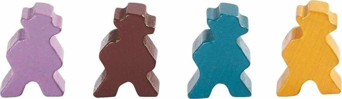 Close-up of four Karuba game pawns in purple, brown, blue and yellow