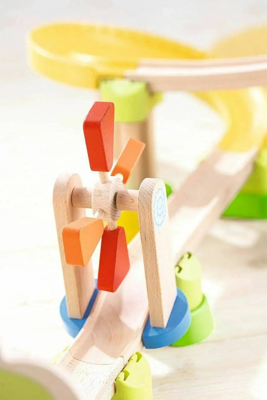 Close-up of the rotating red and orange paddles on the Kullerbu Windmill track