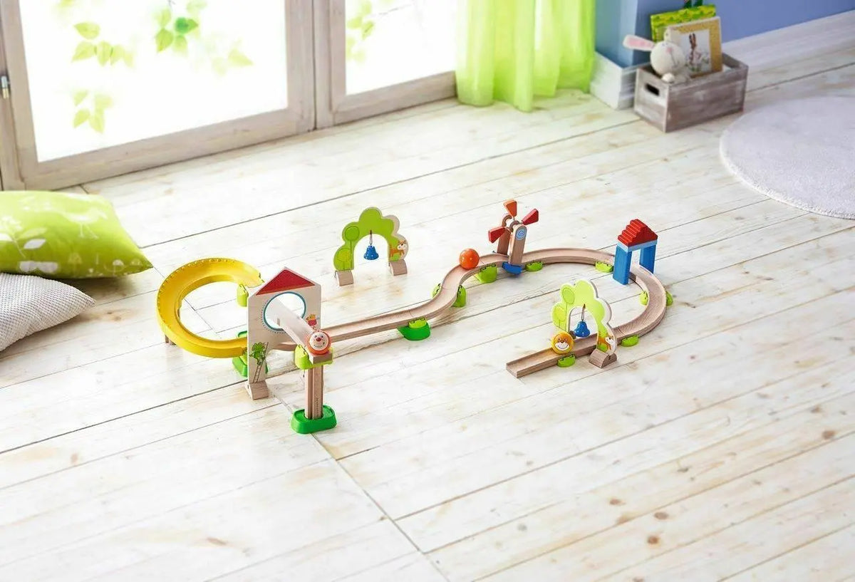 Kullerbu Windmill track arranged on the floor with an additional red-roof block house in the scene