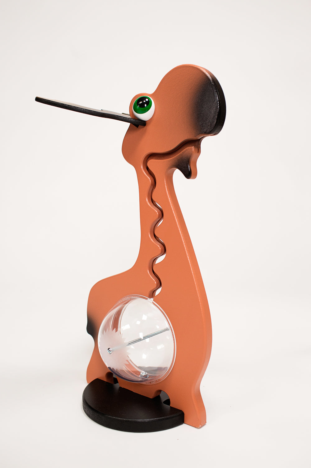 Angled view of the brown moose coin bank and projecting antlers