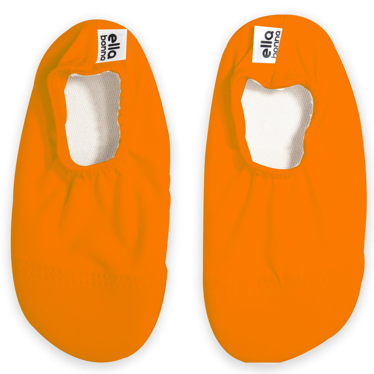 Top view of a pair of orange slip-on water shoes with cream lining on a white background.