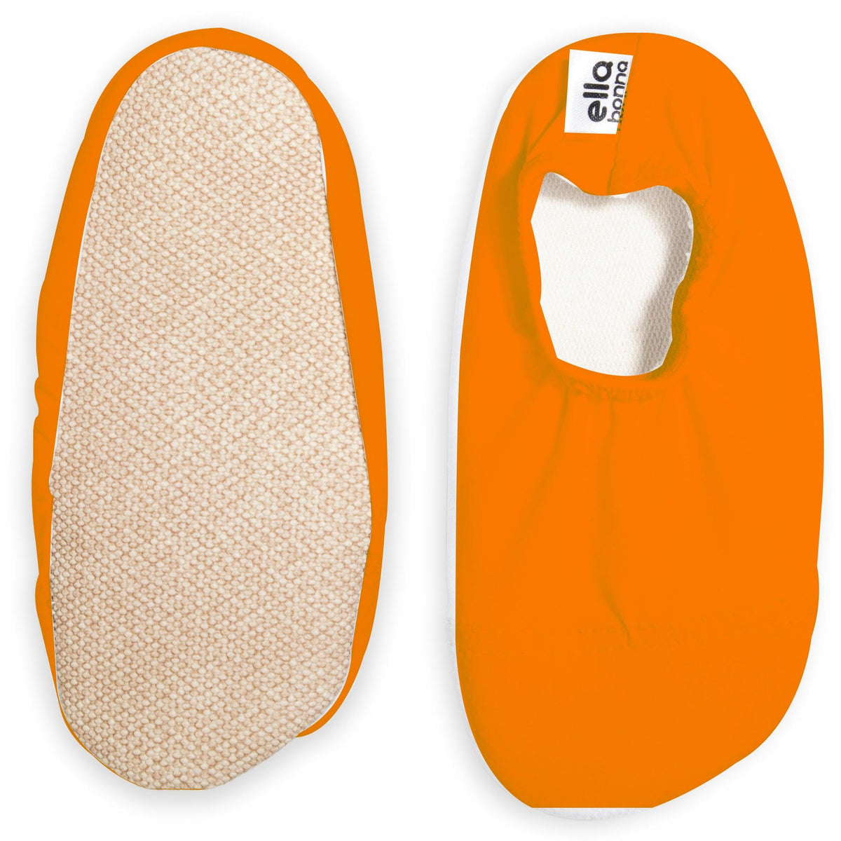Orange slip-on water shoes with cream lining, with one sole facing the camera on a white background.