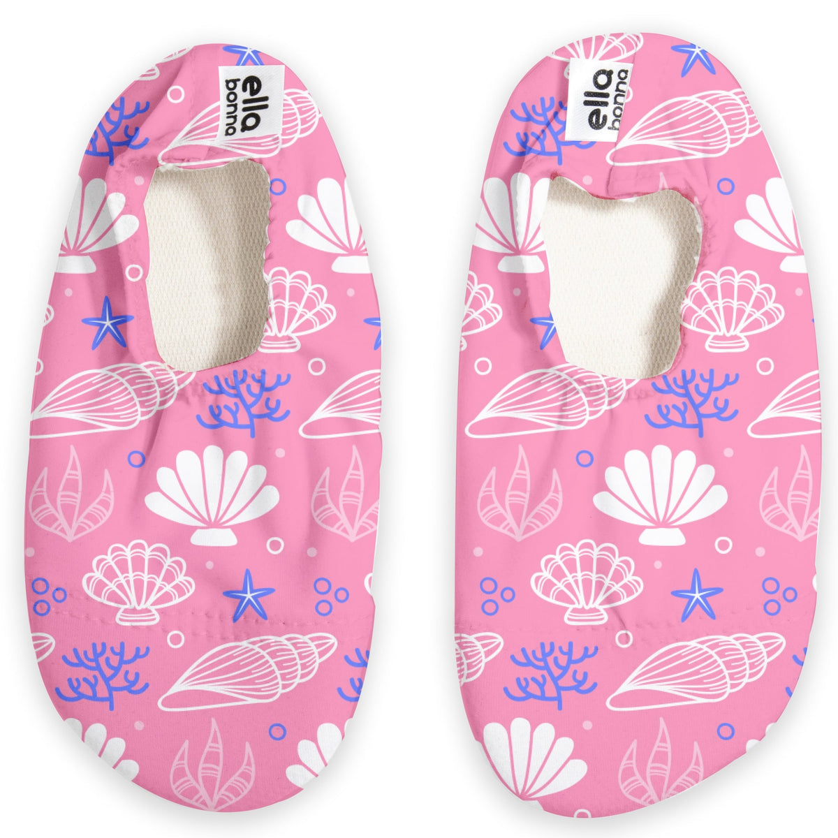 Top view of a pair of pink slip-on water shoes with pale shells and purple sea motifs on a white background.