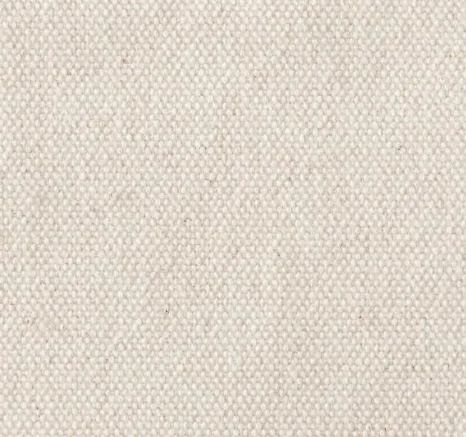 Close-up of the natural canvas fabric's woven texture.