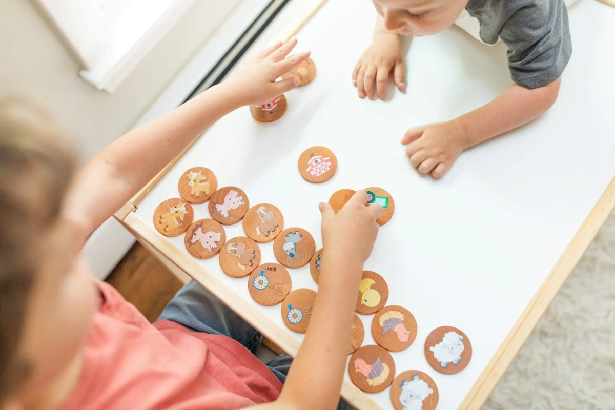 Lifestyle photo showing farm matching tiles with a child
