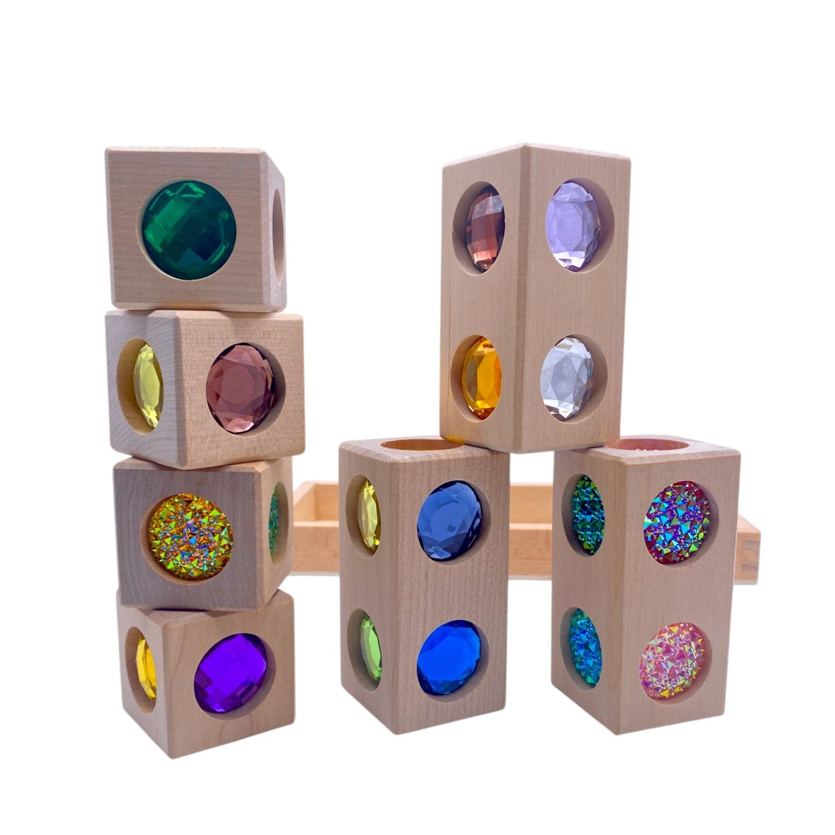 Style C gem cubes and rectangular blocks stacked into three towers