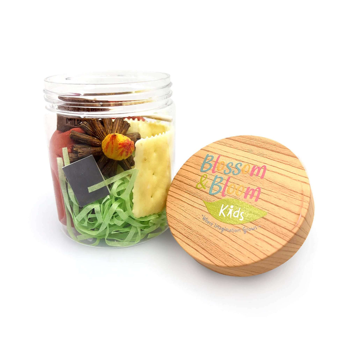 Open S'mores Fun playdough jar showing camping accessories with its branded lid alongside