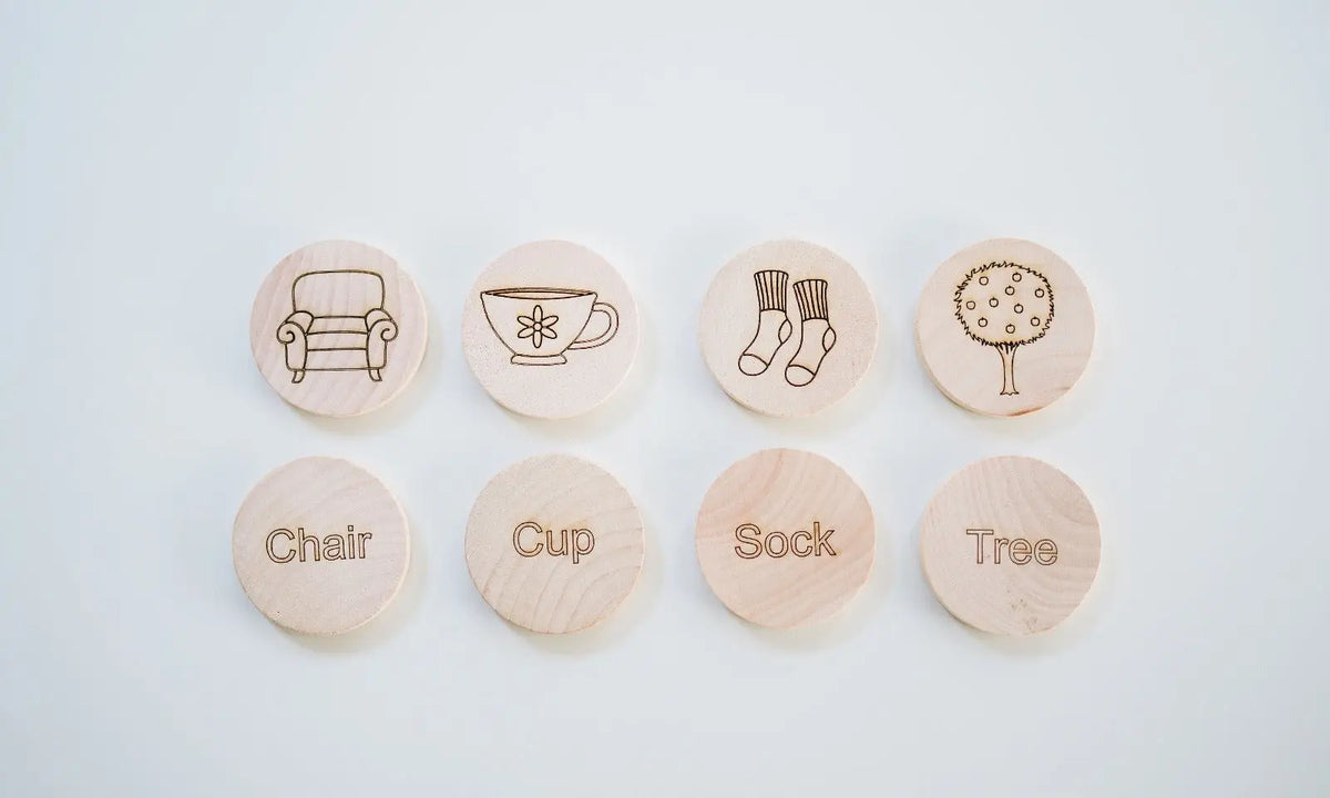 Wooden sight-word tiles pairing words with engraved picture outlines