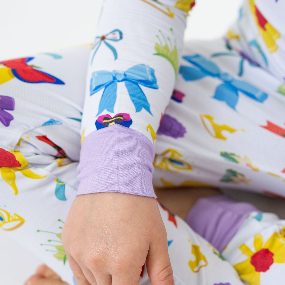 Close-up of the wrist cuff and fabric on Bam & Stitch Sparkle & Reign Long Sleeve Pajamas.