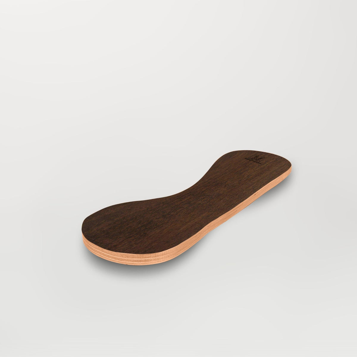 Dark-brown Spinzee board with visible grain, angled view.