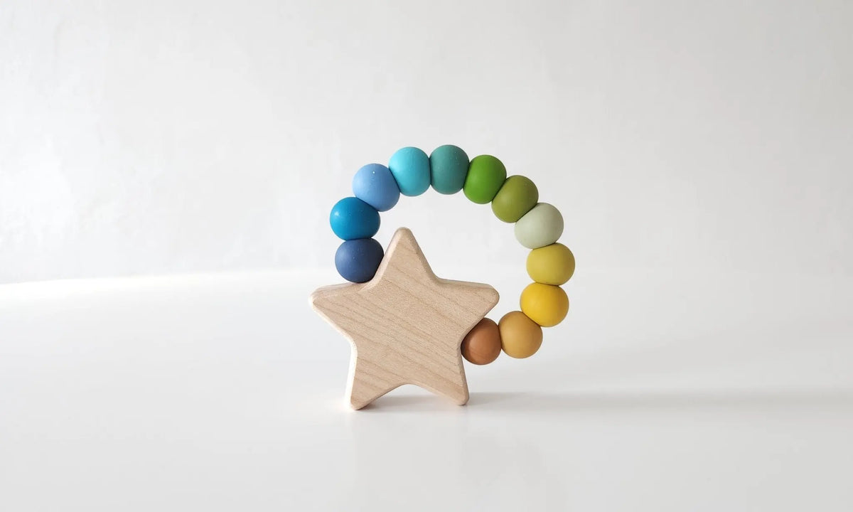 Star Charm Teether with blue, green and yellow silicone beads