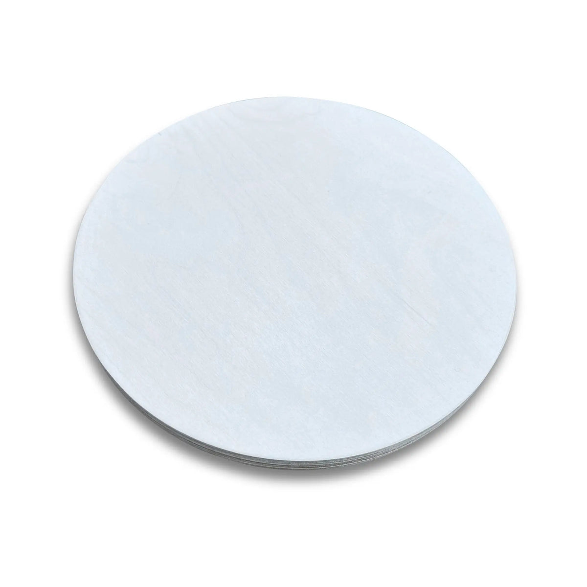 Close-up of a white round stepping stone on a white background.