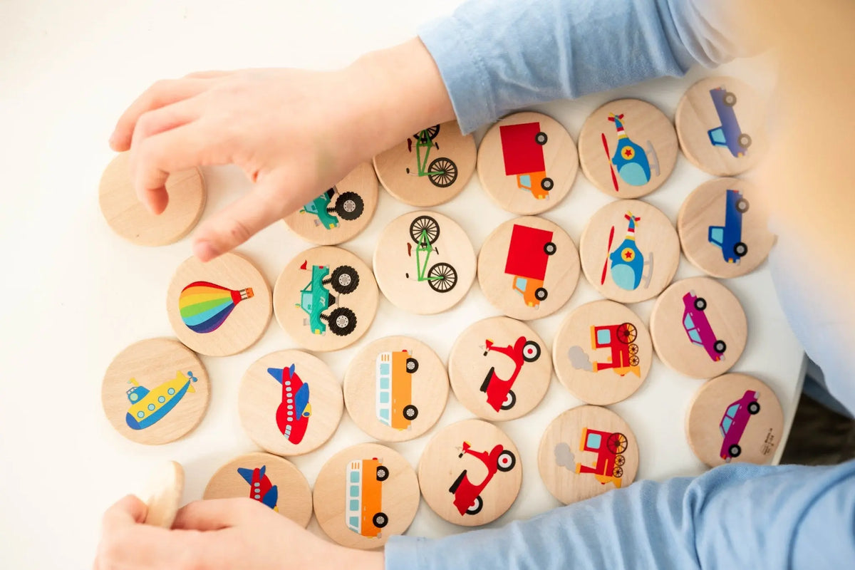 Lifestyle photo showing transportation matching tiles with a child