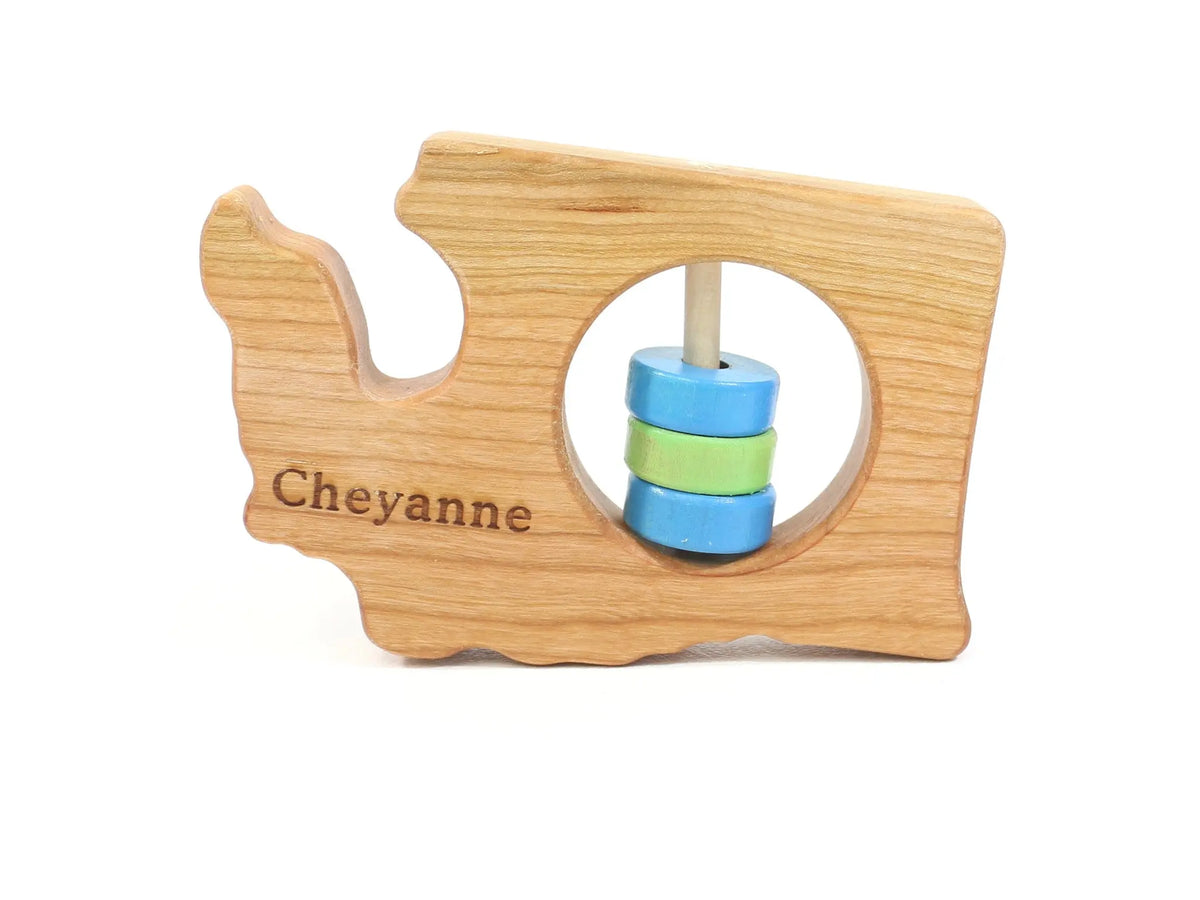 Bannor Toys Washington State Wooden Baby Rattle with example laser engraving and colored rattle discs