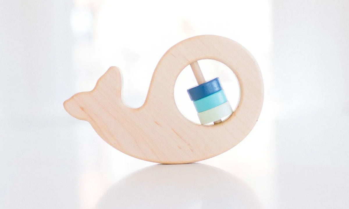Bannor Toys Whale Wooden Baby Rattle, showing wooden shape and movable rattle pieces