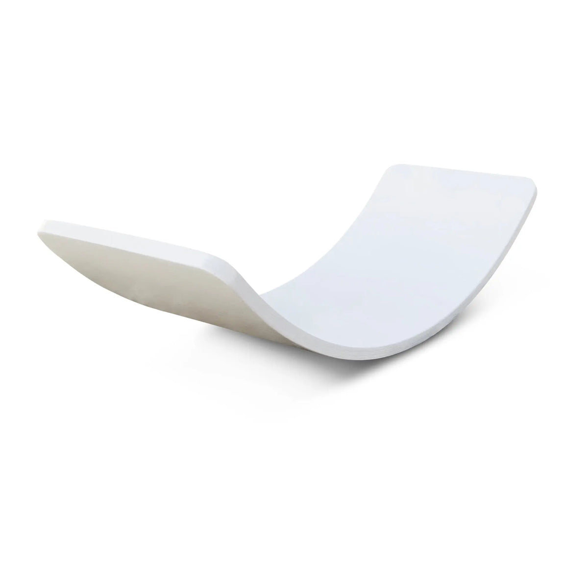 White wobble board with a pronounced upward curve, angled view of its concave surface.