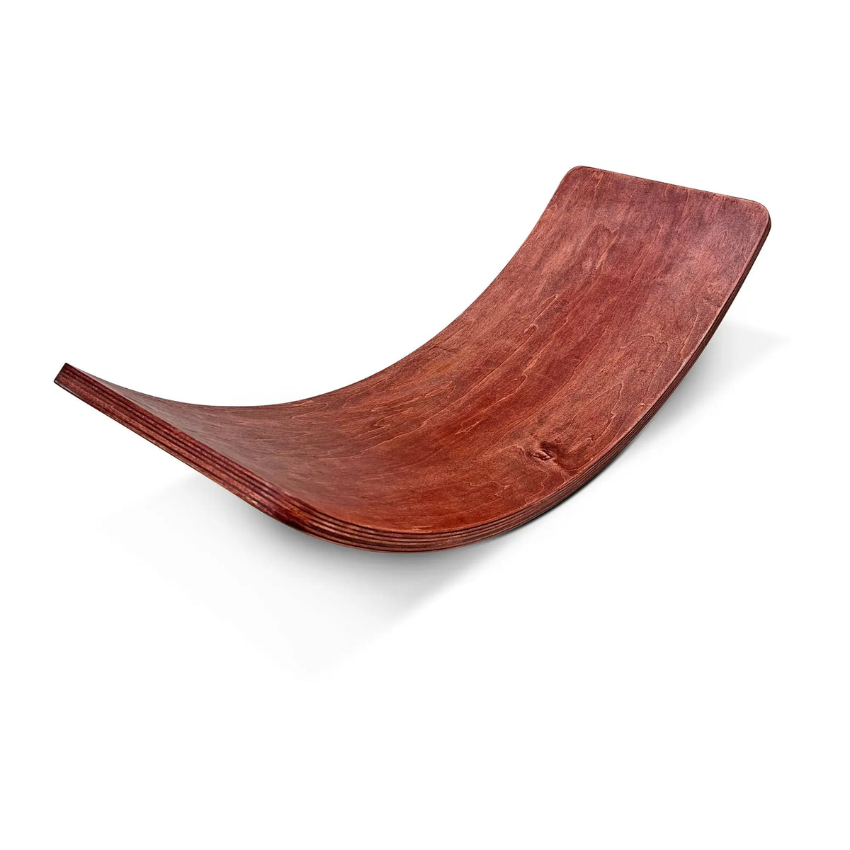 Reddish-brown wobble board with a pronounced upward curve, angled view.