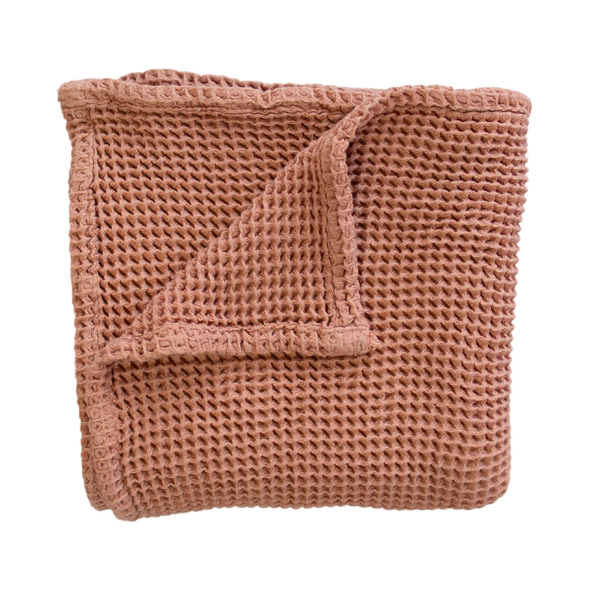 SpiritnSprout: Folded cinnamon-colored waffle baby blanket