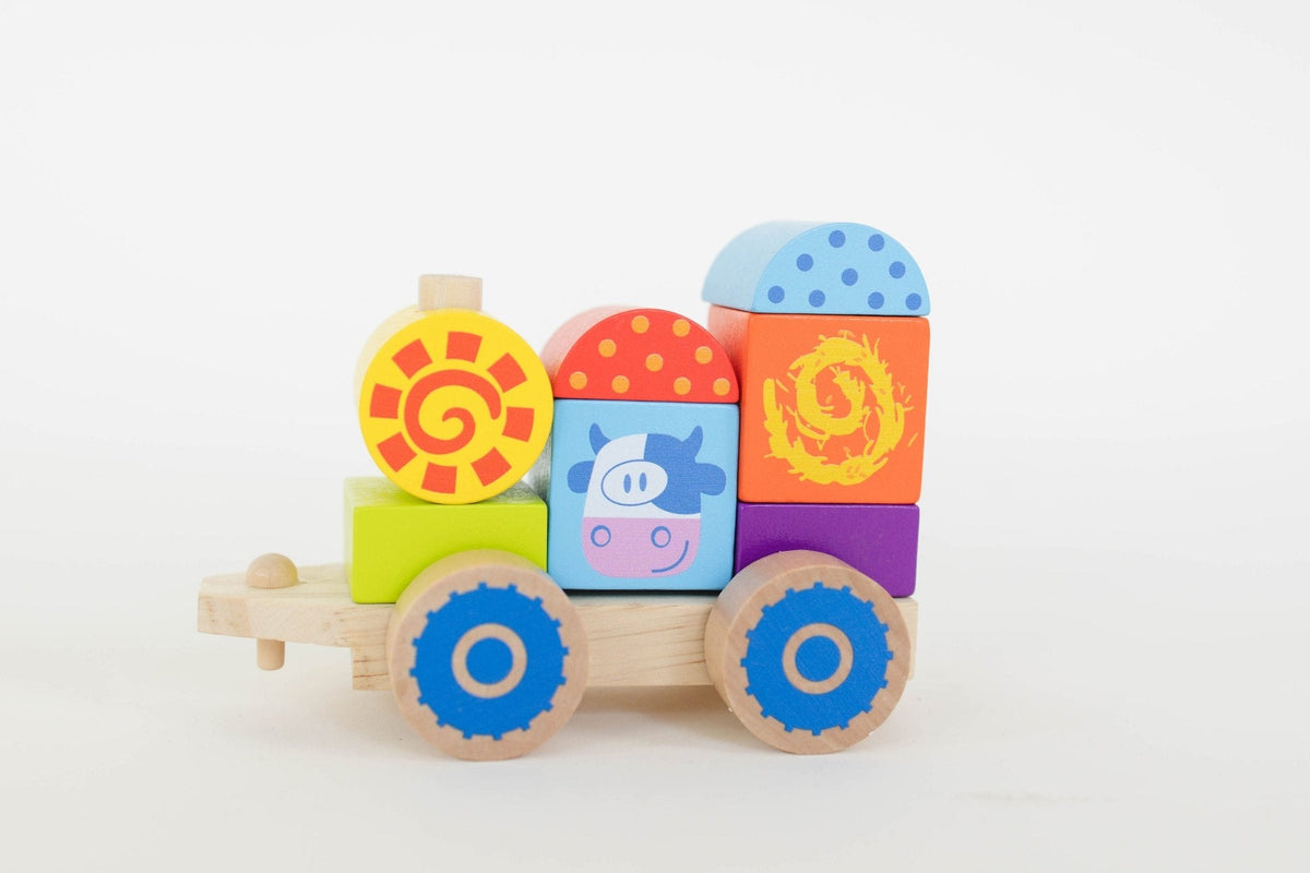 SpiritnSprout: Blue-wheeled train car with stacked farm and animal blocks