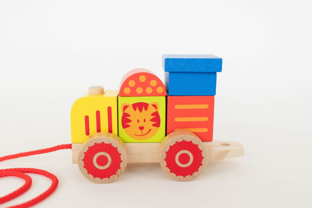 SpiritnSprout: Red-wheeled locomotive with stacked farm blocks and pull string