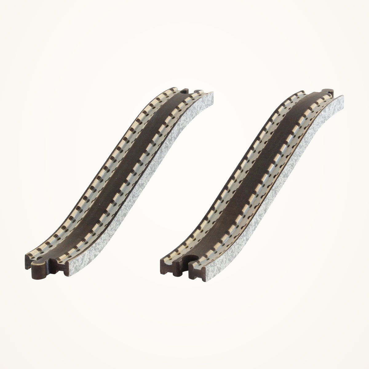 Maple Landmark Bridge Track Pair Ascending/Descending for Wooden Train Set photographed on a warm ivory background.
