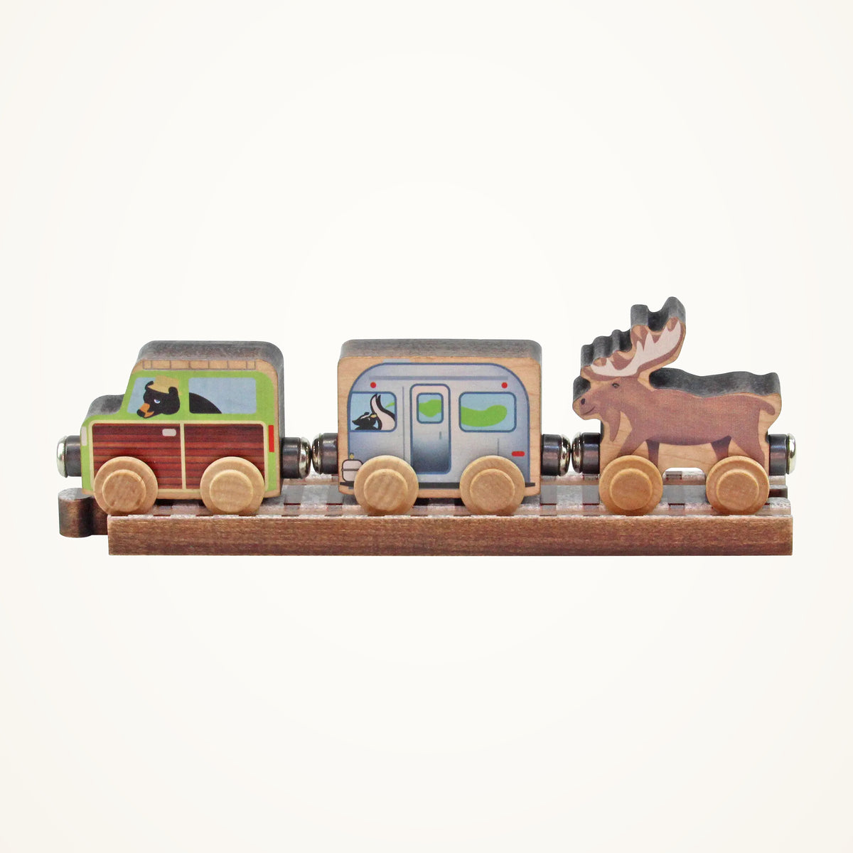 Maple Landmark NameTrains Camper Van Set photographed on a warm ivory background.
