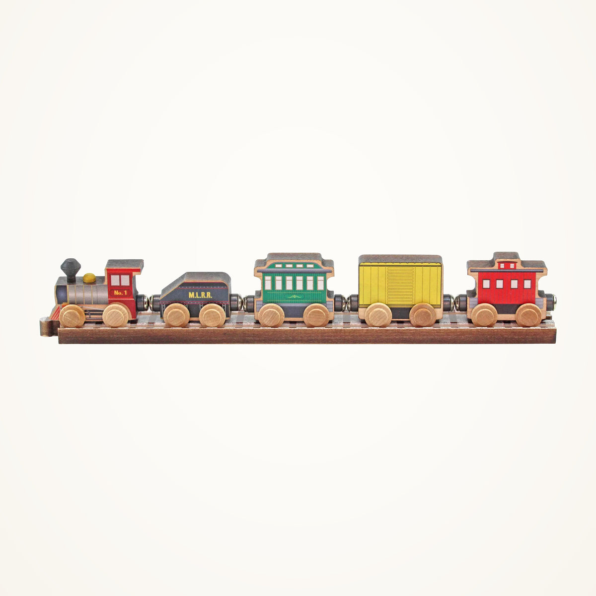Maple Landmark Classic Train Car Set photographed on a warm ivory background.