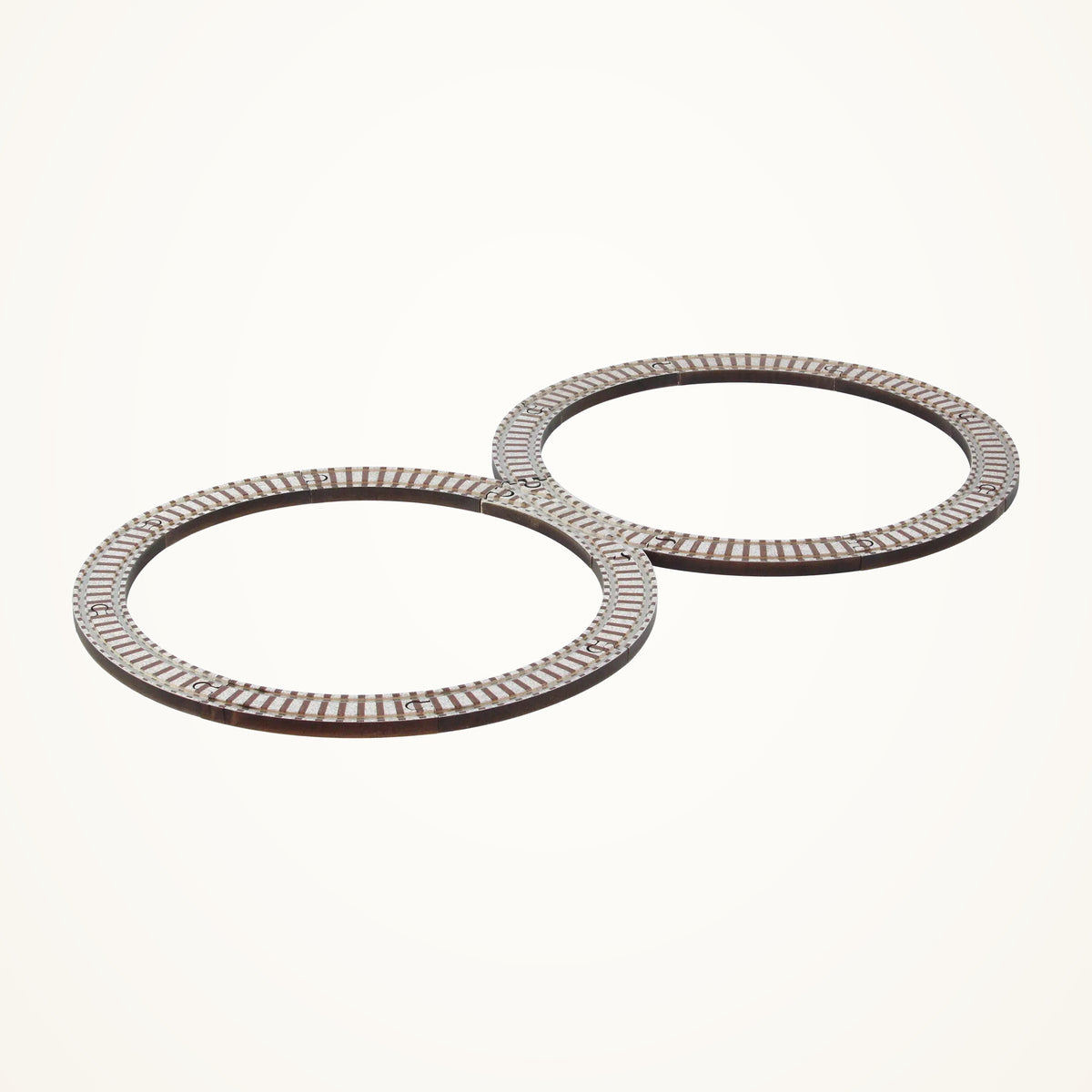 Maple Landmark 15 Piece Figure Eight Track Set photographed on a warm ivory background.