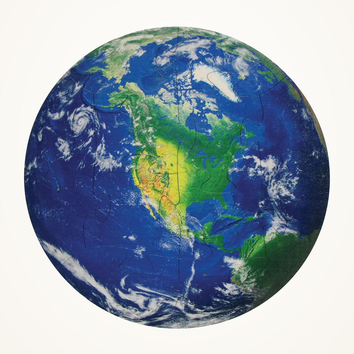 Maple Landmark Earth Shaped Puzzle photographed on a warm ivory background.