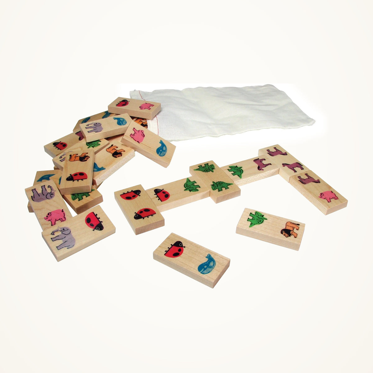Maple Landmark Animal Dominoes photographed on a warm ivory background.