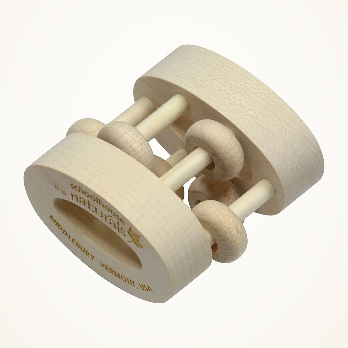 Maple Landmark Unfinished Oval Bead Wooden Rattle on a warm ivory background