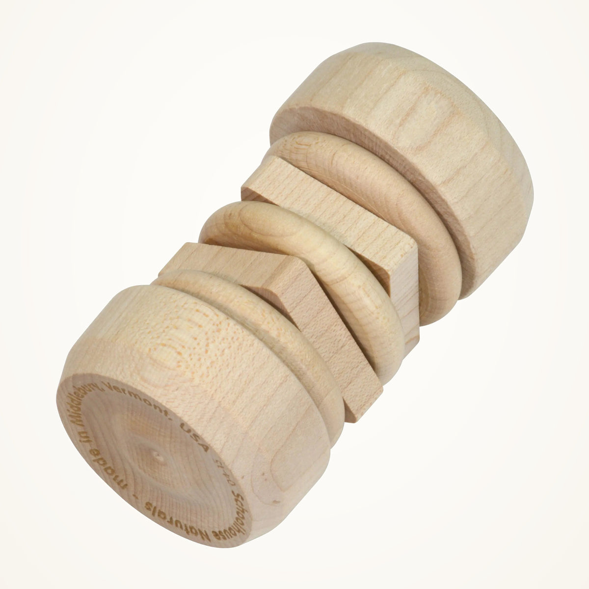 Maple Landmark Unfinished Wooden Disk Rattle on a warm ivory background